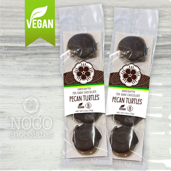 Two packages of NOCO Chocolates 4-piece vegan and dairy-free pecan turtle patties