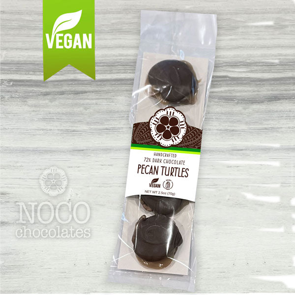 One package of NOCO Chocolates 4-piece vegan and dairy-free pecan turtle patties