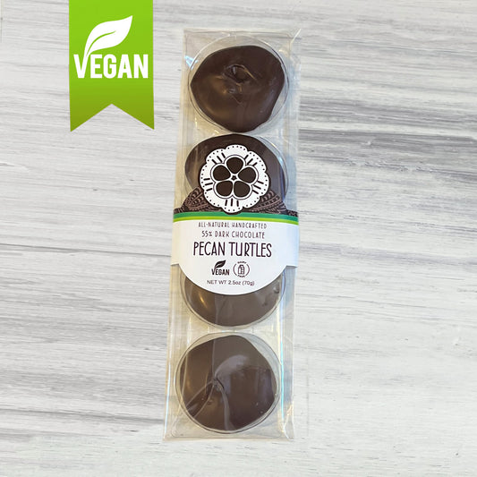 One package of NOCO Chocolates 4-piece vegan and dairy-free pecan turtle patties