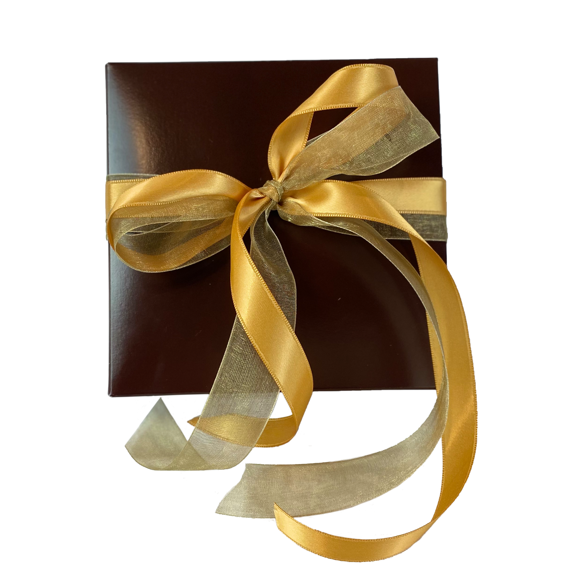 A rick chocolate colored gift box wrapped in gold sating and sheer ribbon